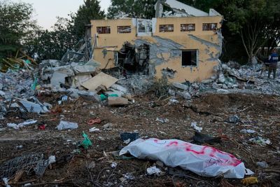 After a hard fight to clear militants, Israeli soldiers find a scene of destruction, slain children
