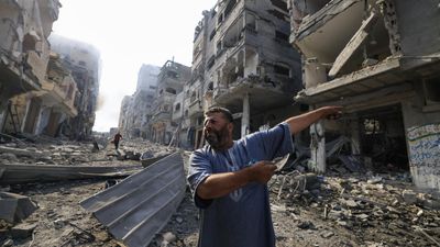 Israeli strike destroys residential building in Gaza refugee camp, killing dozens
