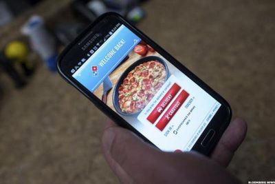 Domino's Pizza earnings top forecasts, revenues slide amid soft summer demand
