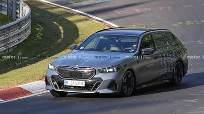 BMW i5 Touring Spied In Light Camo Lapping The Nurburgring