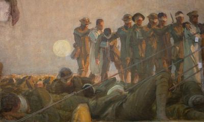 ‘It glows’: restorer removes queasy look from first world war painting Gassed