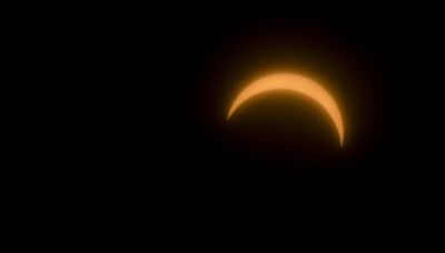 A partial solar eclipse will be visible over Chicago this weekend if clouds clear