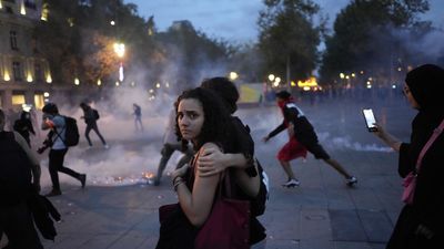 Police use teargas on banned pro-Palestinian rally in Paris as Macron calls for unity