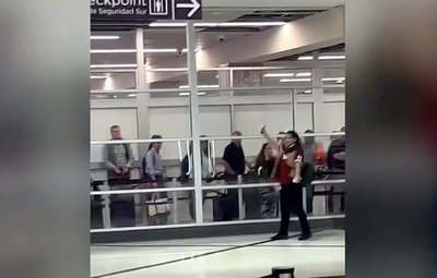 Video shows police arrest woman accused of stabbing taxi driver and others at Atlanta airport