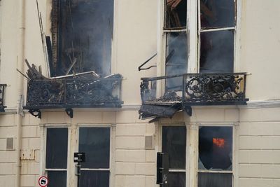 Historic Brighton hotel fire caused by discarded cigarette, fire service says