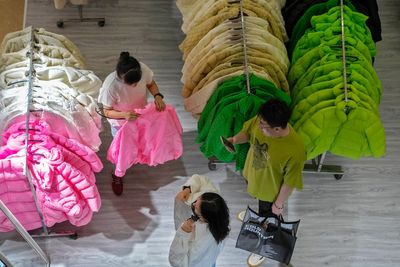 China's inflation data show economy in doldrums despite a slight improvement in trade