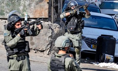 Violence hits East Jerusalem and West Bank as Israel orders Gaza evacuation