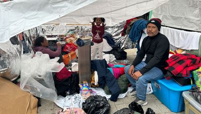 Migrants sleeping outside Chicago police stations brace for winter: ‘We aren’t prepared’
