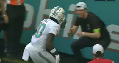 Tyreek Hill actually got penalized for doing a backflip with someone’s phone as a TD celebration