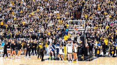 The Coolest Scenes From Iowa Women’s Basketball Game at School’s Football Stadium