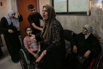 AP PHOTOS: Israel-Hamas war's 9th day leaves survivors bloody and grief stricken