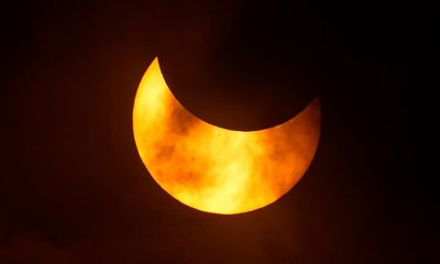 ‘A gorgeous sight’: delight and wonder as US viewers watch annular solar eclipse