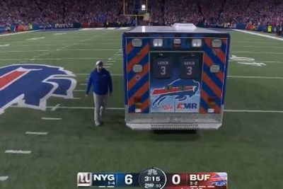 Ambulance carrying Buffalo Bills player off the pitch sports jersey of Damar Hamlin