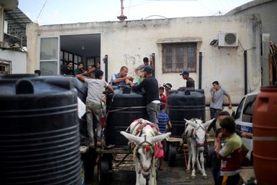 A man and his donkey ensure Gaza people don’t go thirsty amid Israeli siege