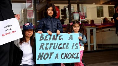 Dozens of asylum seekers protest against legal limbo