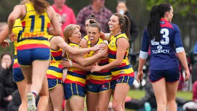 Crows beat Dees in thriller to go outright top in AFLW