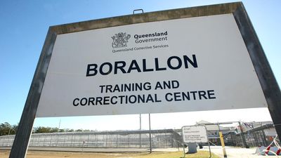 Two prisoners taken to hospital after rooftop protest