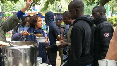 Paris court overturns police ban on food handouts for migrants, homeless