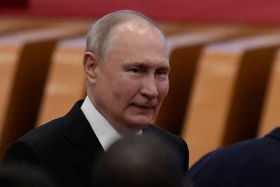 Russian President Putin and Chinese leader Xi meet in Beijing and call for close policy coordination