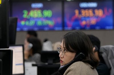 Stock market today: World markets edge lower as China reports slower growth in the last quarter
