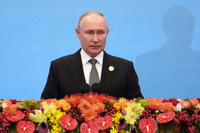 European delegates walk out of China-led international summit as Vladimir Putin starts speaking