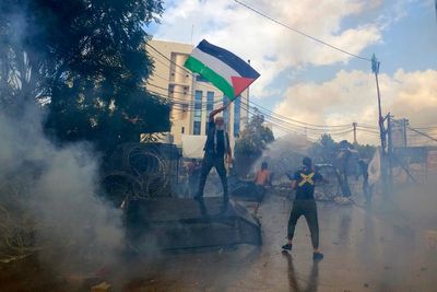 Protesters in Lebanon decrying Gaza hospital blast clash with security forces near U.S. Embassy