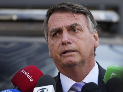 Lawmakers in Brazil say Bolsonaro should be charged with attempting to stage a coup