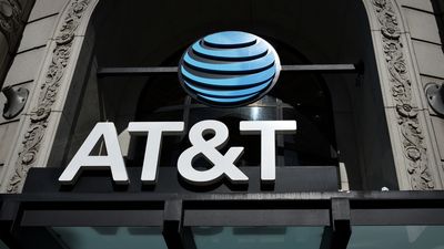 AT&T jumps after 13 earnings beat, cash-flow boost from iPhone promotion efforts