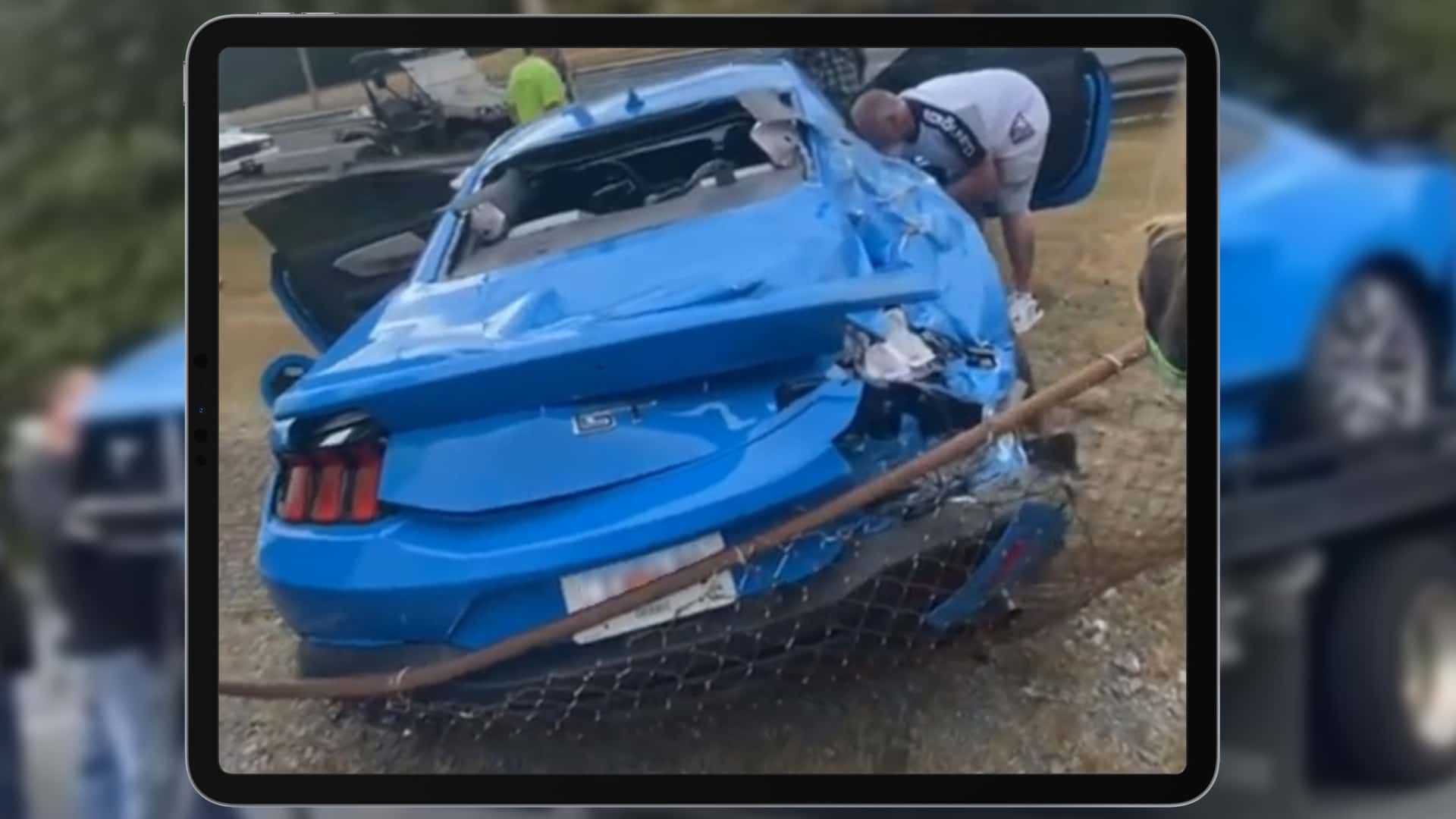 Watch 2024 Ford Mustang GT Crash Into, And Over, Fence…