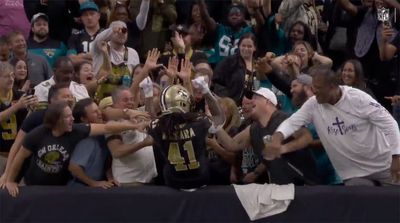 Alvin Kamara Jumped All the Way Into the Stands After Scoring Game-Tying Two-Point Conversion