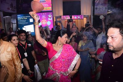 Sushmita Sen performs Dhunuchi dance during Durga puja celebration