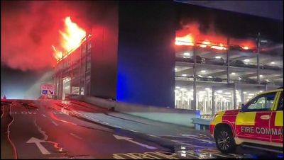Luton airport fire caused by vehicle fault, as man arrested as precaution