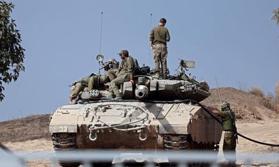 ‘Like a terrible dream’: tense wait for Israeli soldiers near Gaza border
