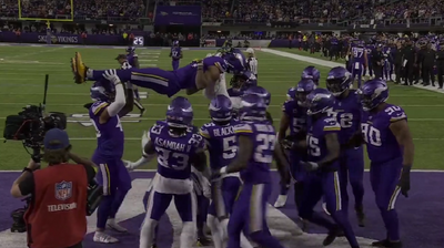 The Vikings defense celebrated a turnover by lifting Akayleb Evans into the air and doing the limbo under him