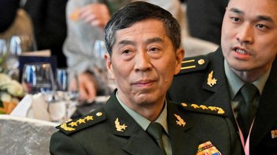 China fires defence minister not seen in public for two months