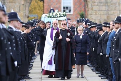 Funeral held for police officer who died after being hit by a train