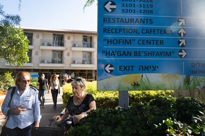 Attacked by Hamas at home, Israeli survivors find solace in a hotel
