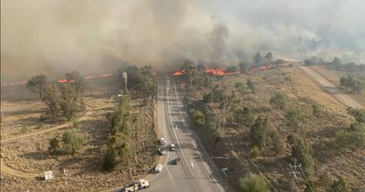Highway reopens after grass fire burns out of control