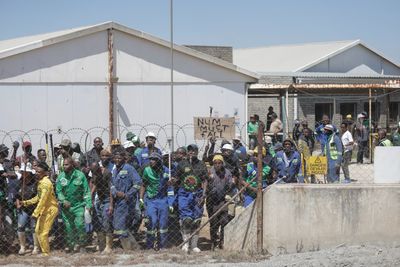 South African ‘hostage’ miners emerge from underground amid union dispute