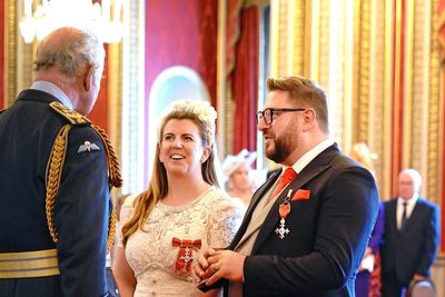 Heart charity couple offer King a defibrillator after being awarded MBEs