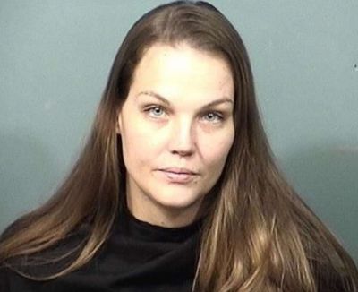 Mother arrested after leaving young children in car while she went to a bar