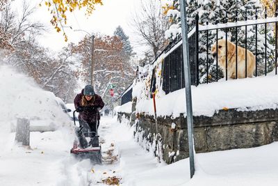 Snow piles up in North Dakota as region's first major snowstorm of the season moves eastward