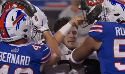 Buccaneers punter Jake Camarda swung his helmet at a Bills player and refs weirdly picked up the flag