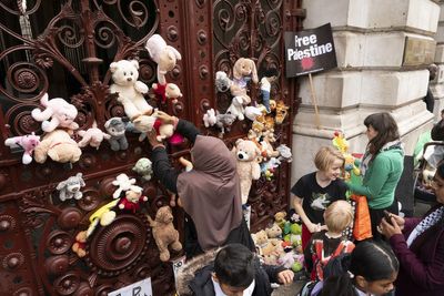 Children leave teddies outside Foreign Office as part of call for Gaza ceasefire