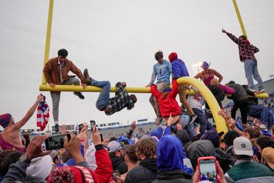 Kansas Fans Were So Pumped After Beating Oklahoma, They Tossed the Goal Post Into a Lake