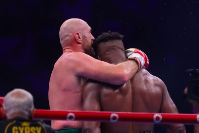 Francis Ngannou knocks down heavyweight champ Tyson Fury, who escapes with split decision