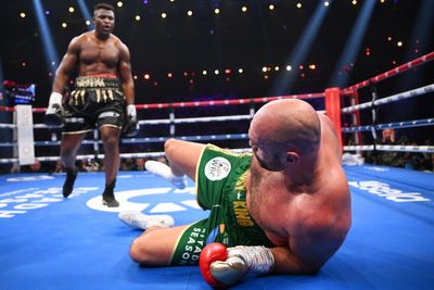 Tyson Fury survives knockdown to beat Francis Ngannou by controversial decision