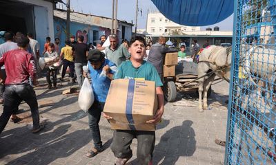 Civil order ‘starting to break down’ in Gaza as people raid UN warehouses