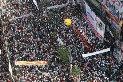 Bangladesh police detain key opposition figure, a day after clashes left one dead and scores injured