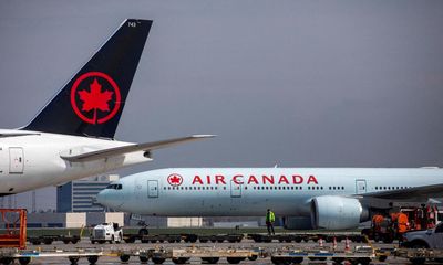 Disabled man drags himself off plane after Air Canada fails to offer wheelchair